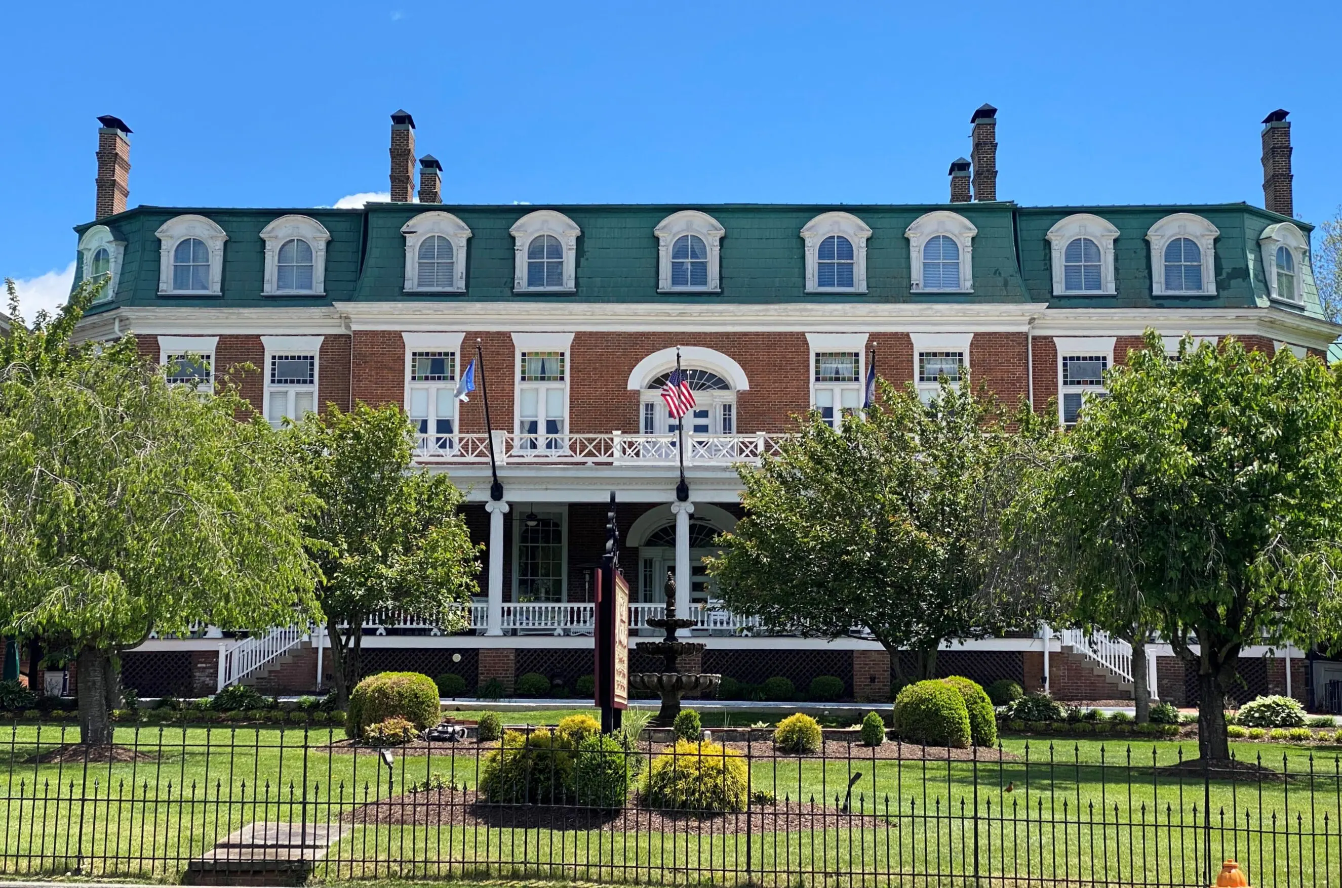 150 West Main St. ,Martha Washington Inn Historic brick building Martha Washington Inn with green mansard roof and white