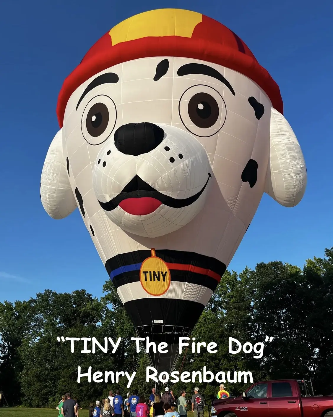 Image 1 Large hot air balloon shaped like a Dalmatian dog wearing a firefighter